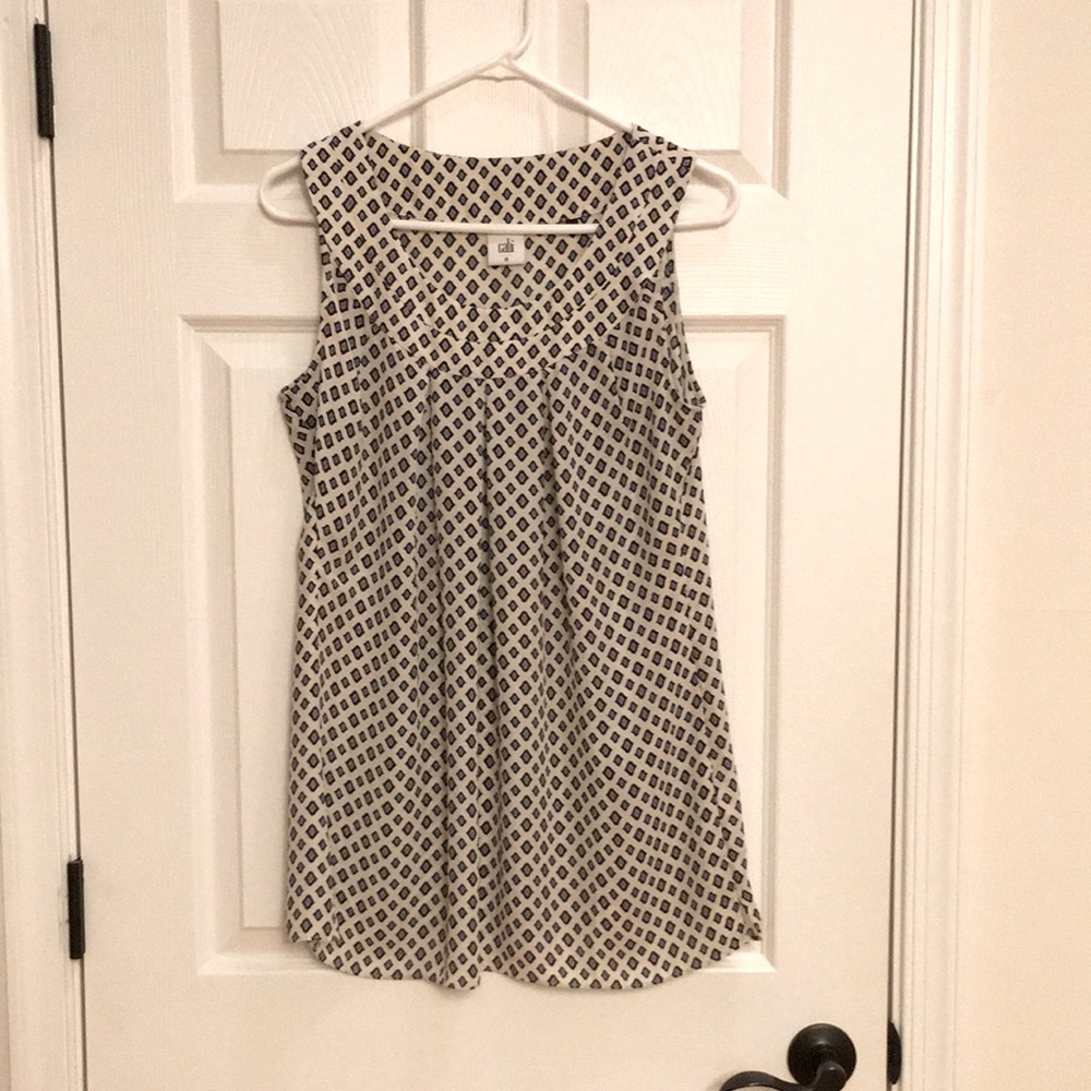 Cabi sleeveless top. White with black blue and pink accents. Size Med.